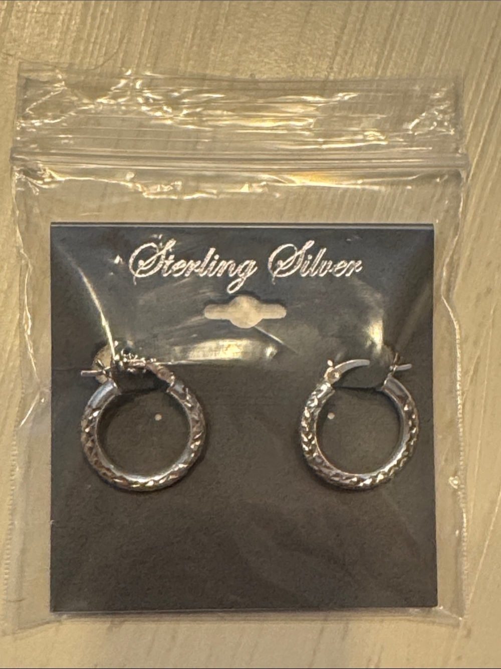 NWT Sterling Silver textured hoop earrings-still in original package with tag